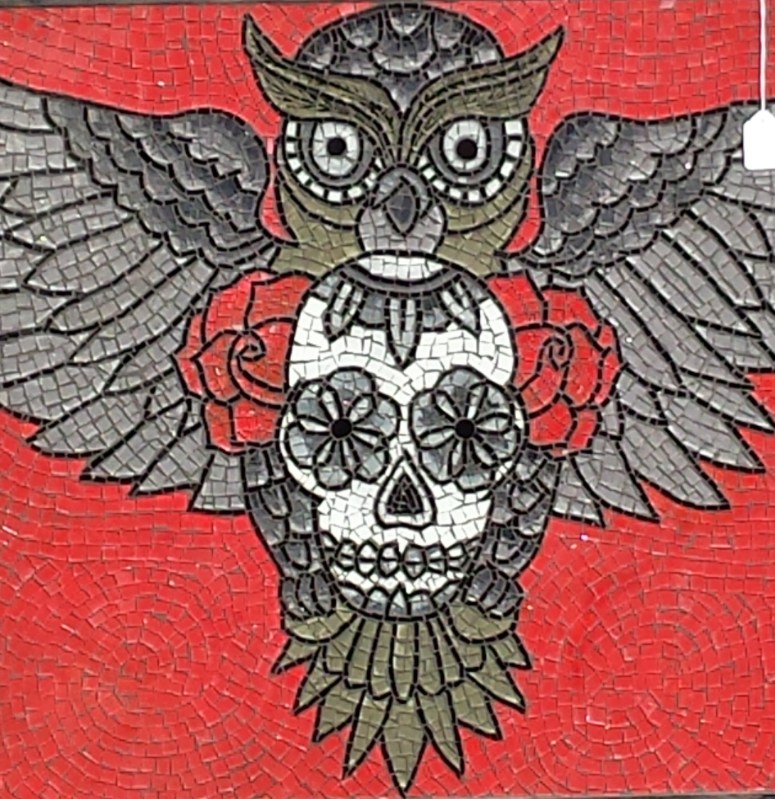 Picture of mosaic glass on wood of Skull and owl